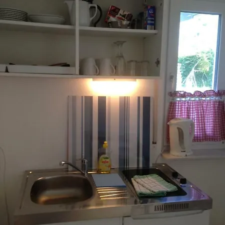 Quarto em Acomodações Particulares Petite Bellevue Ii